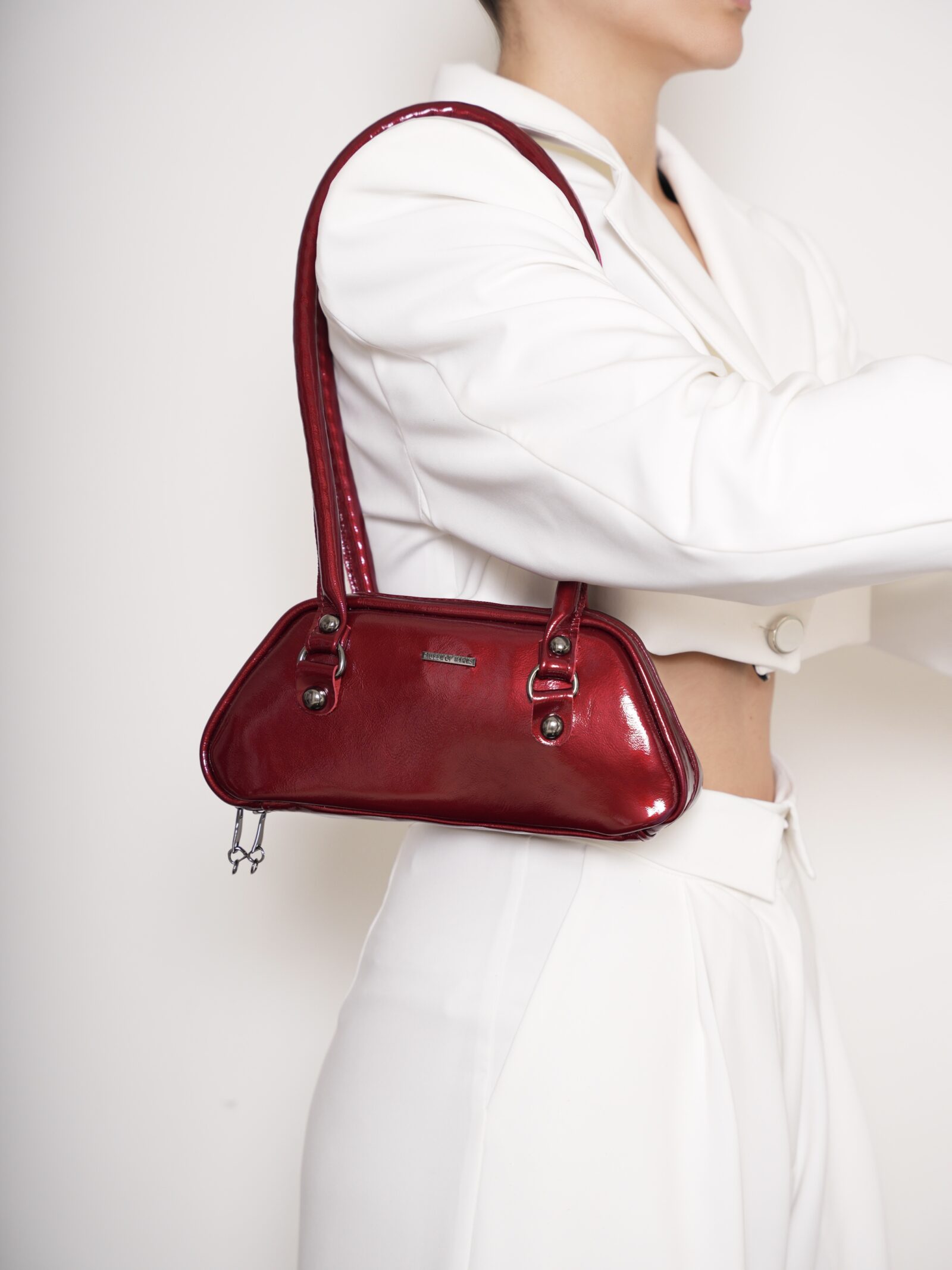 OVAL MINI BAG BY QUEEN OF HARNS