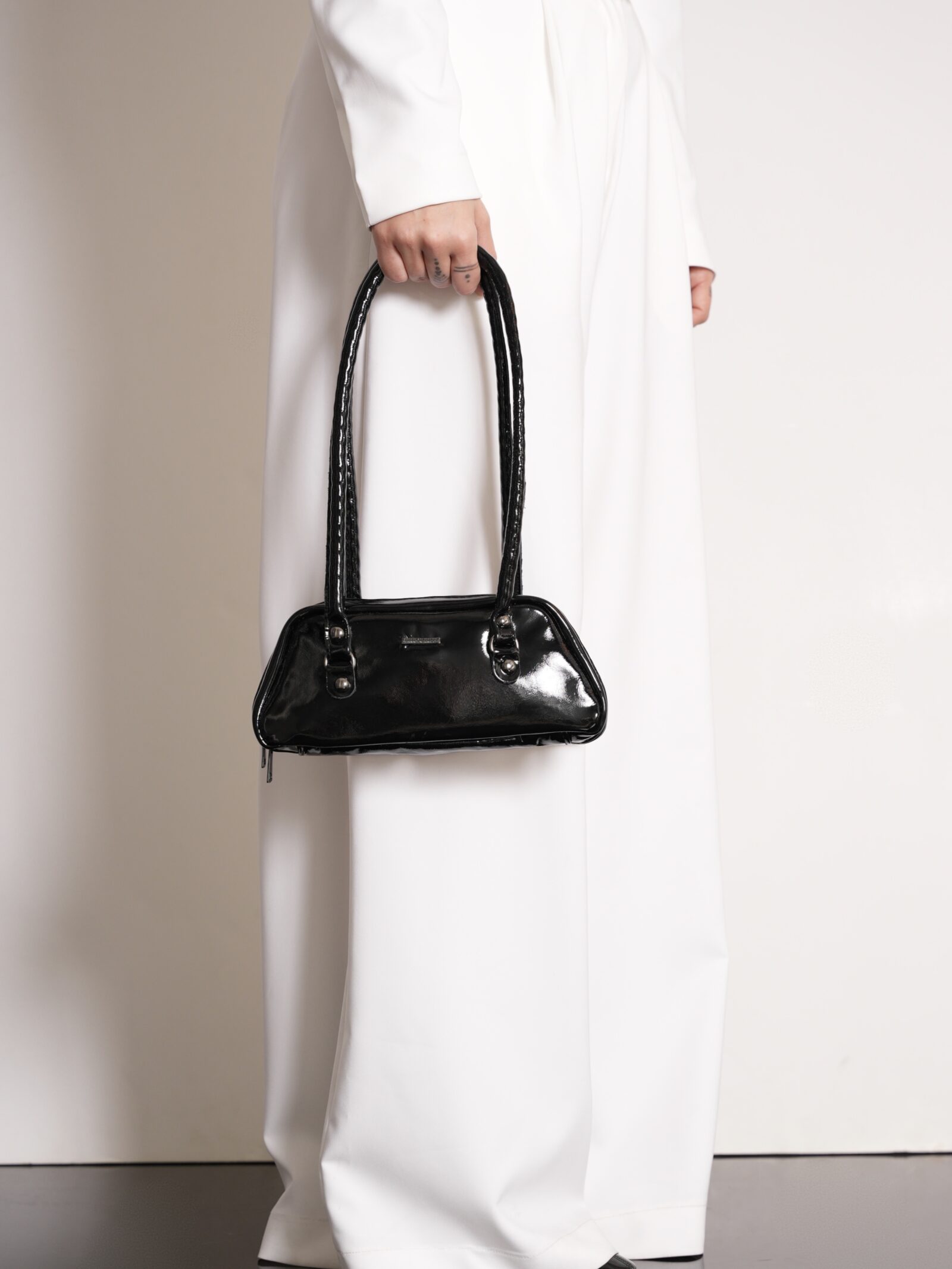 OVAL MINI BAG BY QUEEN OF HARNS